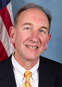 Mark J.F. Schroder, Commissioner