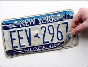 Empire blue and white plate with peeling coating.