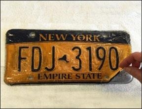 Empire gold plate with peeling coating.